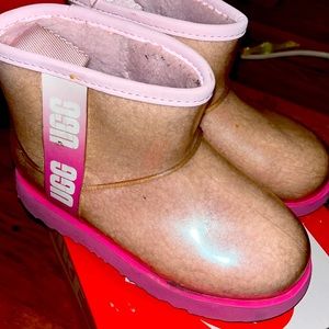 Kids Pink UGGS size 1. Plastic covering, easily wipeable :)